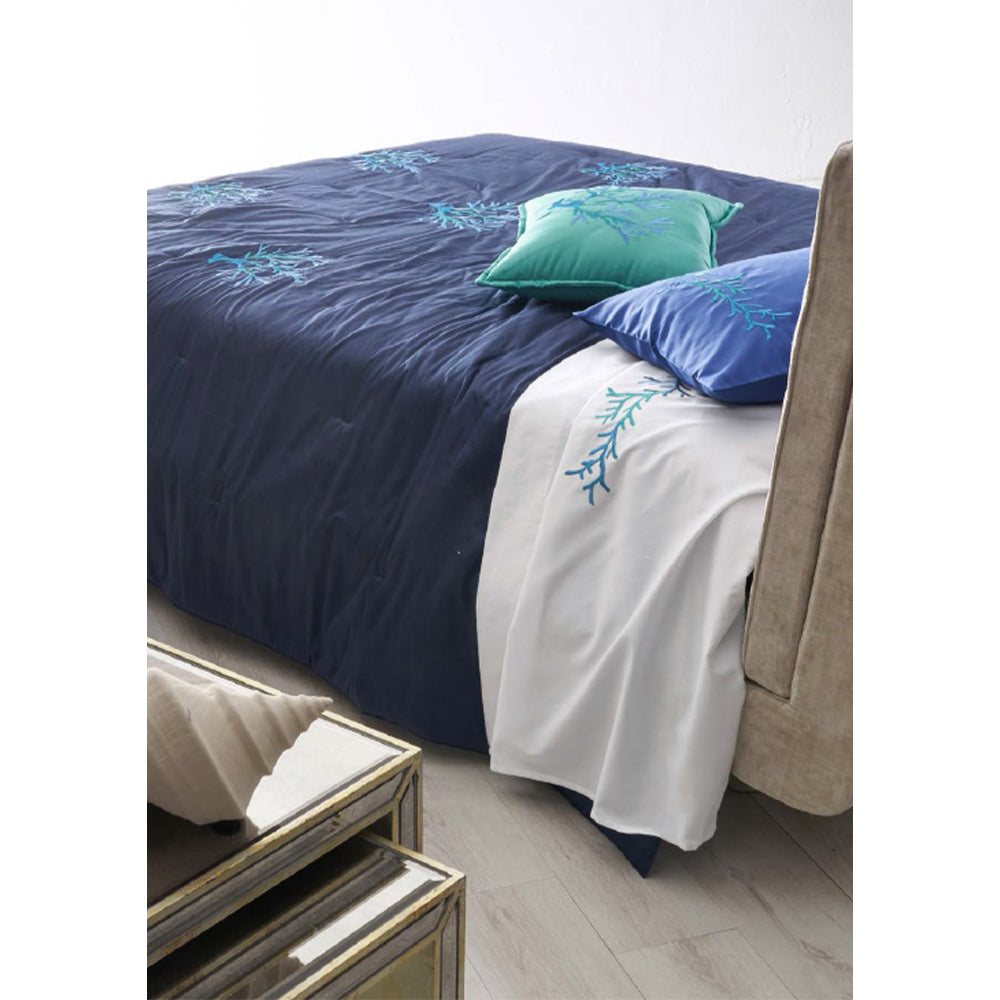 Coralli White with blue and green embroidery